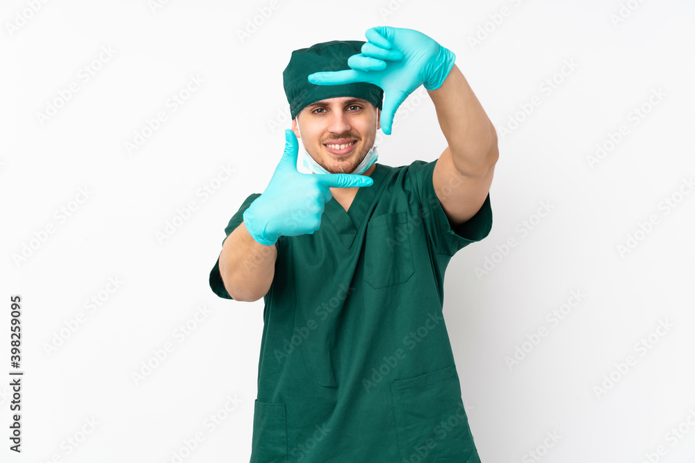 Surgeon in green uniform isolated on isolated white background focusing face. Framing symbol Surgeon in green uniform isolated on isolated white background focusing face. Framing symbol