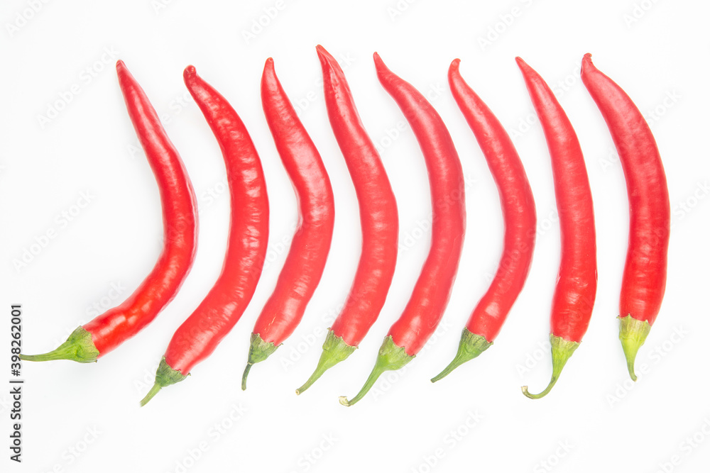Red hot chili peppers on a white background. food figures. Vitamin vegetable food Red hot chili peppers on a white background. food figures. Vitamin vegetable food