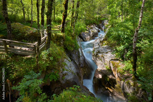 Les Oulles du Diables torrent. Mountain stream in the Valgaudemar Valley in Summer. Ecrins National Park, Hautes Alpes, French Alps, France photo