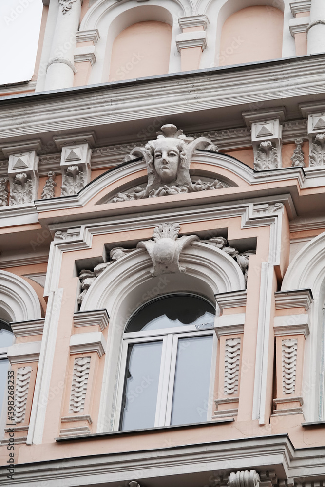 Building facade decor with human face