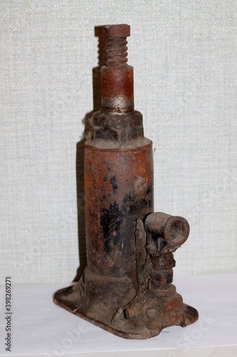 Wallpaper Mural Old rusty hydraulic jack for a truck, made of iron, covered with cobwebs. Torontodigital.ca