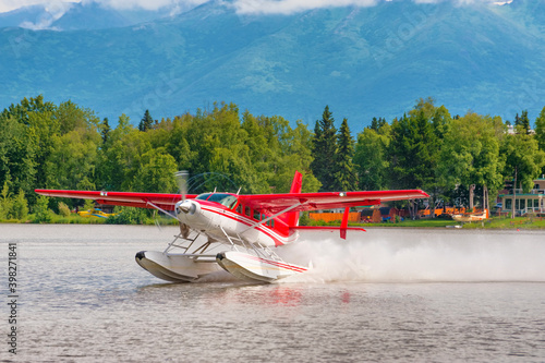 Seaplane takeing off at Lake Hood photo