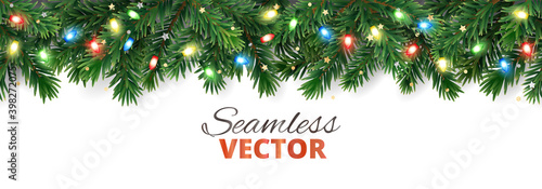 Christmas tree seamless decoration isolated on white. Evergreen tree with colorful lights and ribbons. Festive border, frame. Realistic vector. For holiday headers, banners, party posters.