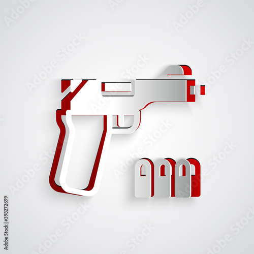 Paper cut Pistol or gun icon isolated on grey background. Police or military handgun. Small firearm. Paper art style. Vector.