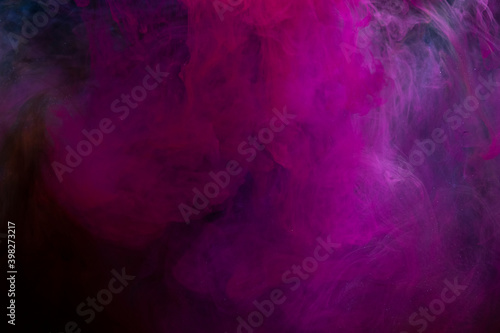 Abstract color paint splash isolated on black background