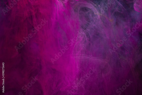 Abstract color paint splash isolated on black background