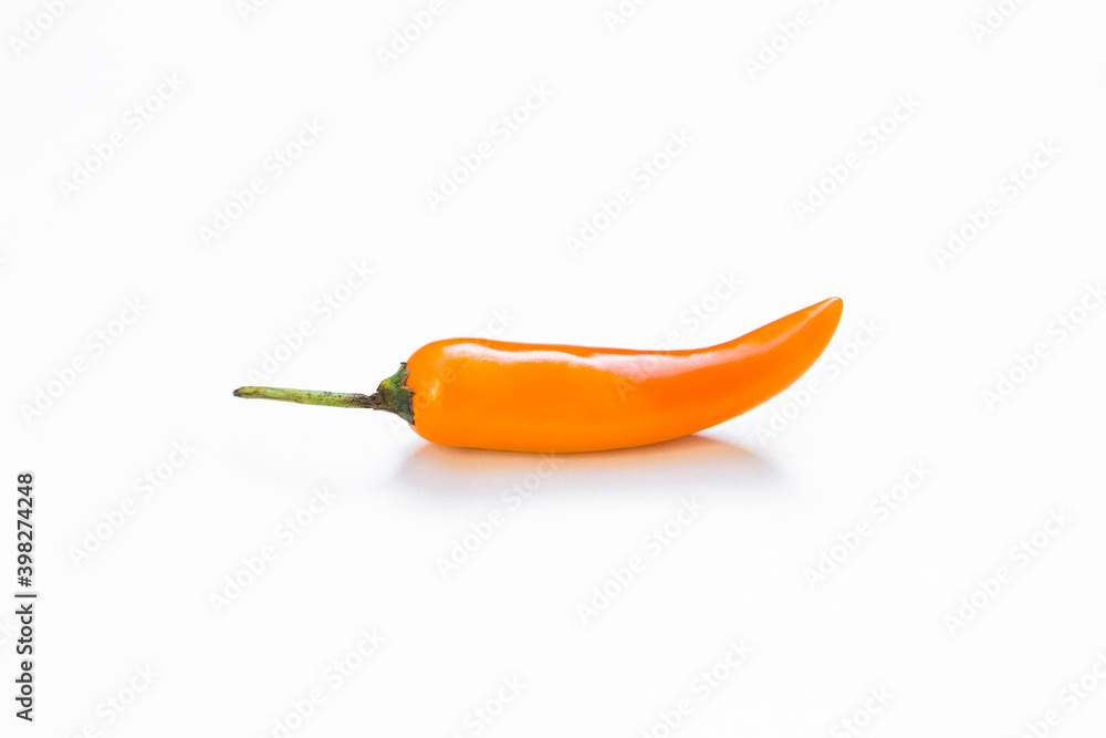 Orange chilli isolate on white background, hot chilli, organic vegetable