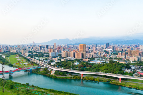 Taipei City Aerial View - Asia business concept image, panoramic modern cityscape building bird’s eye view under sunrise and morning blue bright sky, shot in Taipei, Taiwan © yaophotograph