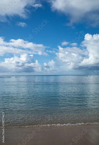 Waikiki Hawaii sand, sea, and clouds.