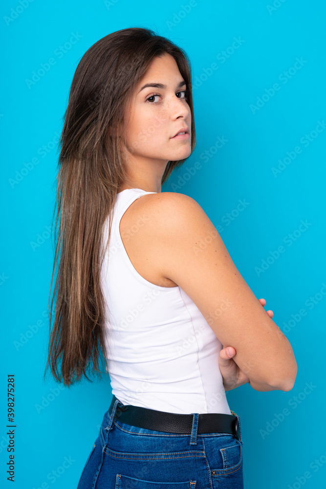 Portrait of pretty teenager Brazilian girl over isolated background Portrait of pretty teenager Brazilian girl over isolated background