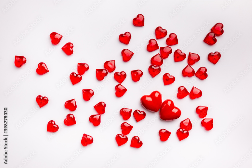 Red Heart shapes on abstract white background. Love concept for valentines day.