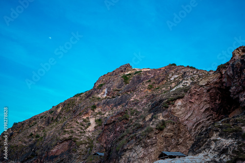 Rocks in the blue sea of Eo Gio cape  Binh Dinh province  Vietnam.