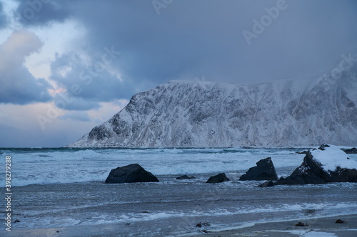 norway coast in winter with snow bad cloudy weather
