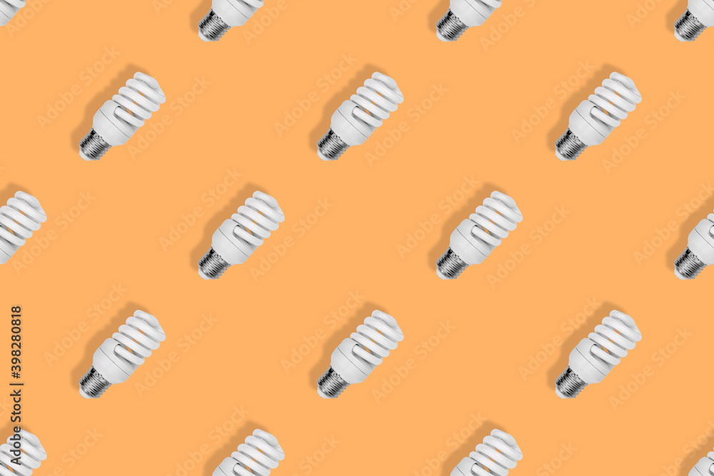 Lighting lamps seamless pattern. Background on the theme of light bulbs. Lighting lamps seamless pattern. Background on the theme of light bulbs.