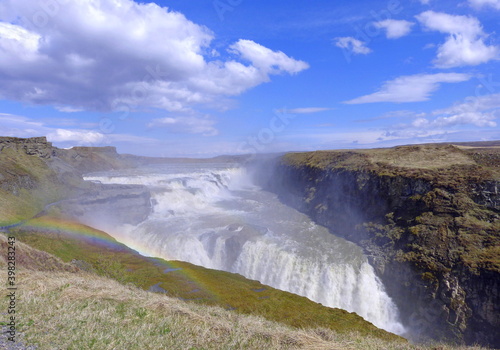 Awesome waterfall Gullfoss with rainbow in Iceland summertime. Icelandic Golden Circle.