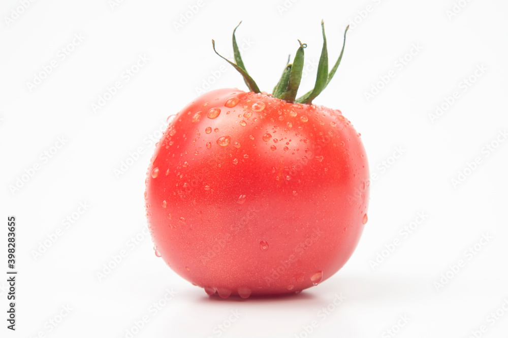 raw red tomato on a white background raw red tomato on a white background