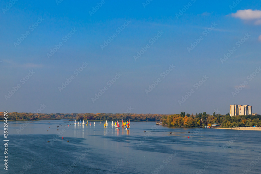 Yachts at sailing regatta on the Dnieper river in Kremenchug, Ukraine Yachts at sailing regatta on the Dnieper river in Kremenchug, Ukraine