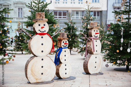 Christmas decoration in Bratislava. Wooden snowman decorations. Christmas in the city. Bratislava, Slovakia. 