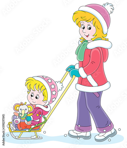 Young cute mom sledding a h...