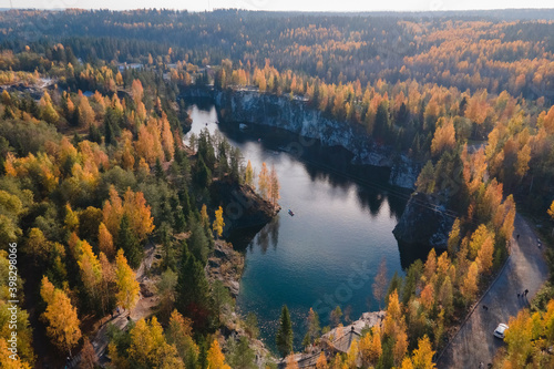 Aerial view of natural park Ruskeala in Karelia, golden autumn with colourful trees in Russia