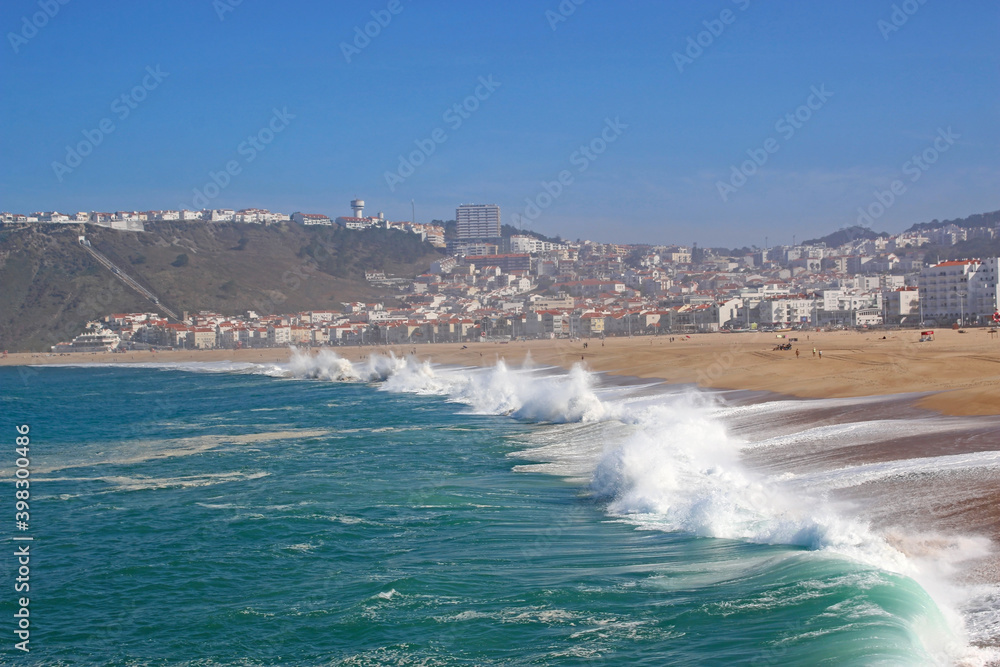 Waves breaking on Nazare Beach, Portugal Waves breaking on Nazare Beach, Portugal