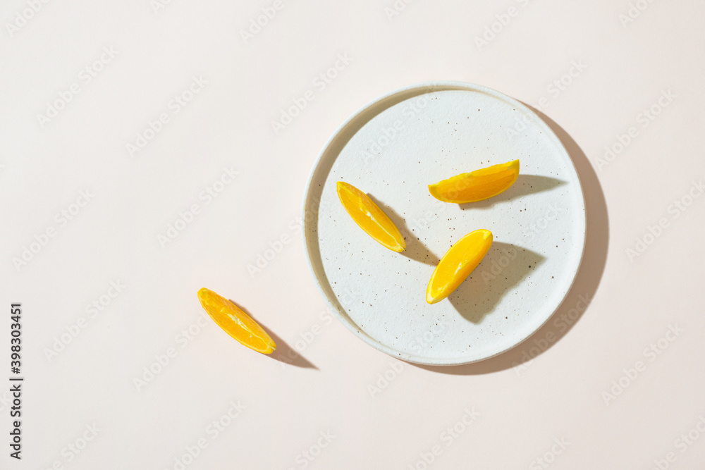 Cut oranges in plate Cut oranges in plate