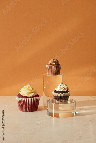 close up view of various sweet cupcakes isolated on cozzy background photo