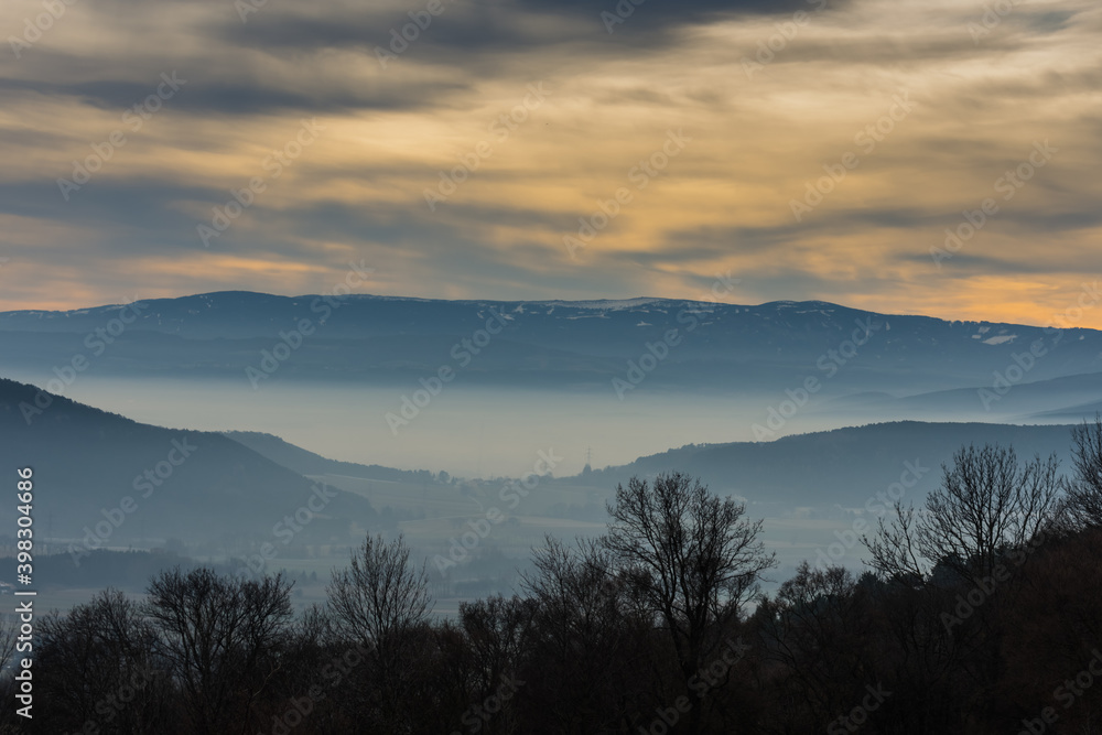 fog and clouds on the sky in the mountains