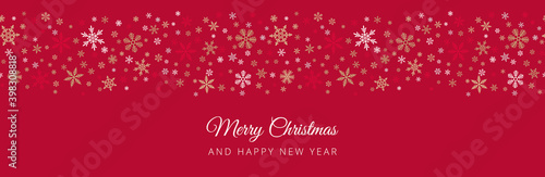 Snowflake seamless border background. Wide vector pattern with small gold and silver snowflakes on red. Merry Christmas and Happy New year header. Design template for banner, greeting card, website