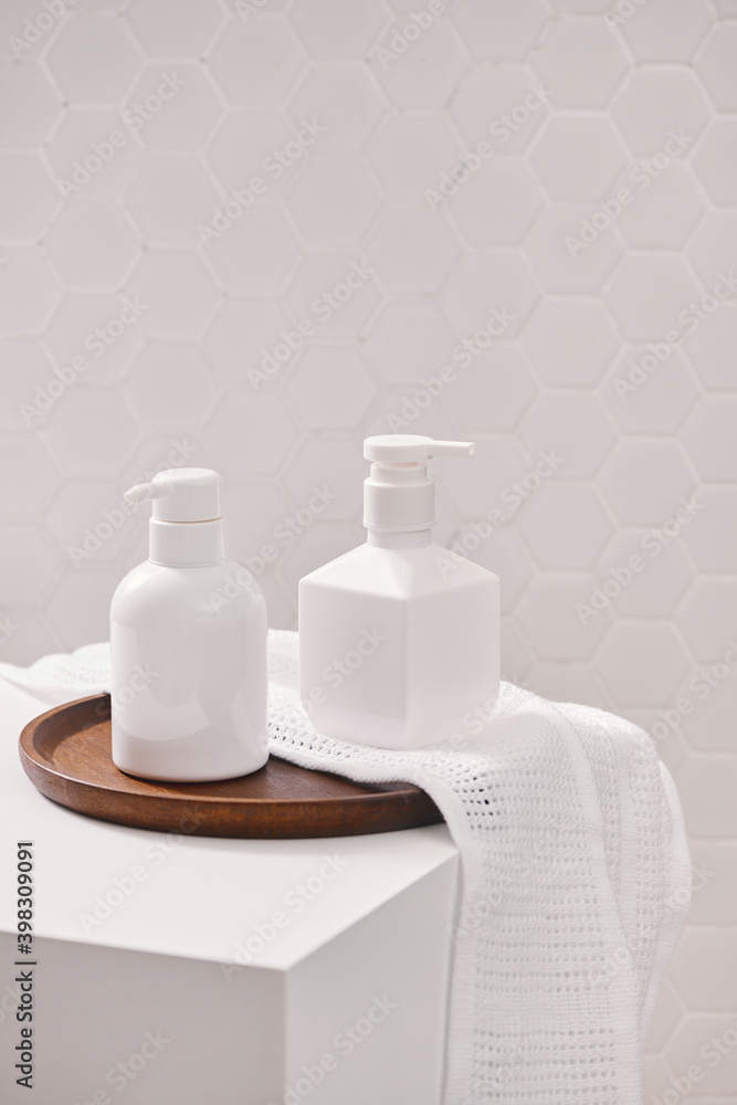 Liquid soap and shampoo bottle on basket Liquid soap and shampoo bottle on basket