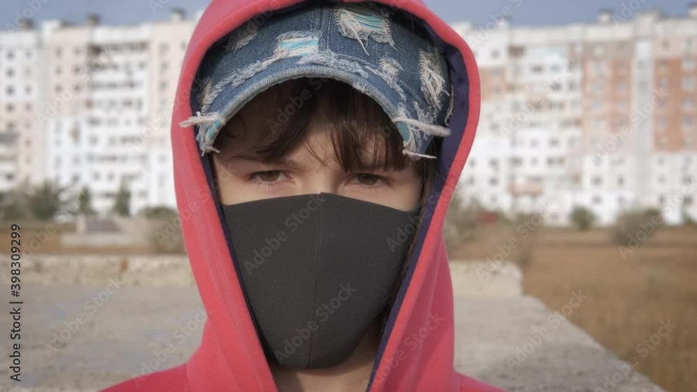 Hide from coronavirus. Portrait of a teenage girl in a protective mask. Hide from coronavirus. Portrait of a teenage girl in a protective mask.