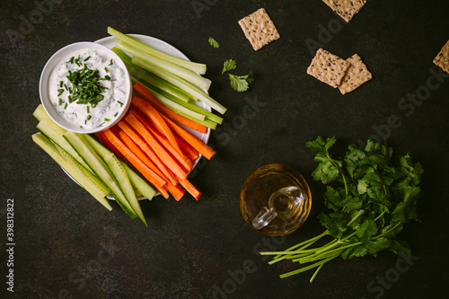 Herb Yogurt Dip with Vegetables and Crackers photo