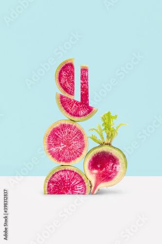 Geometric balancing slices of red radish. photo