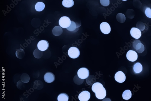 Lights blurred bokeh abstract on dark background, rozmyte światełka na ciemnym tle lampki świąteczne