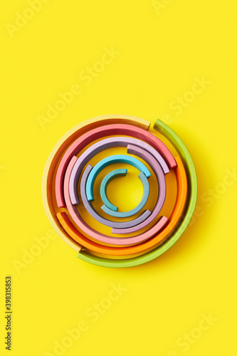 Round wooden colorful labyrinth. photo