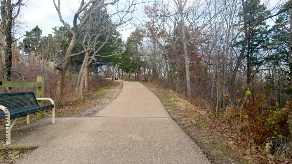 Walking Path Sidewalk with Bench and Surrounding Trees, Aerial Walking Path Sidewalk with Bench and Surrounding Trees, Aerial