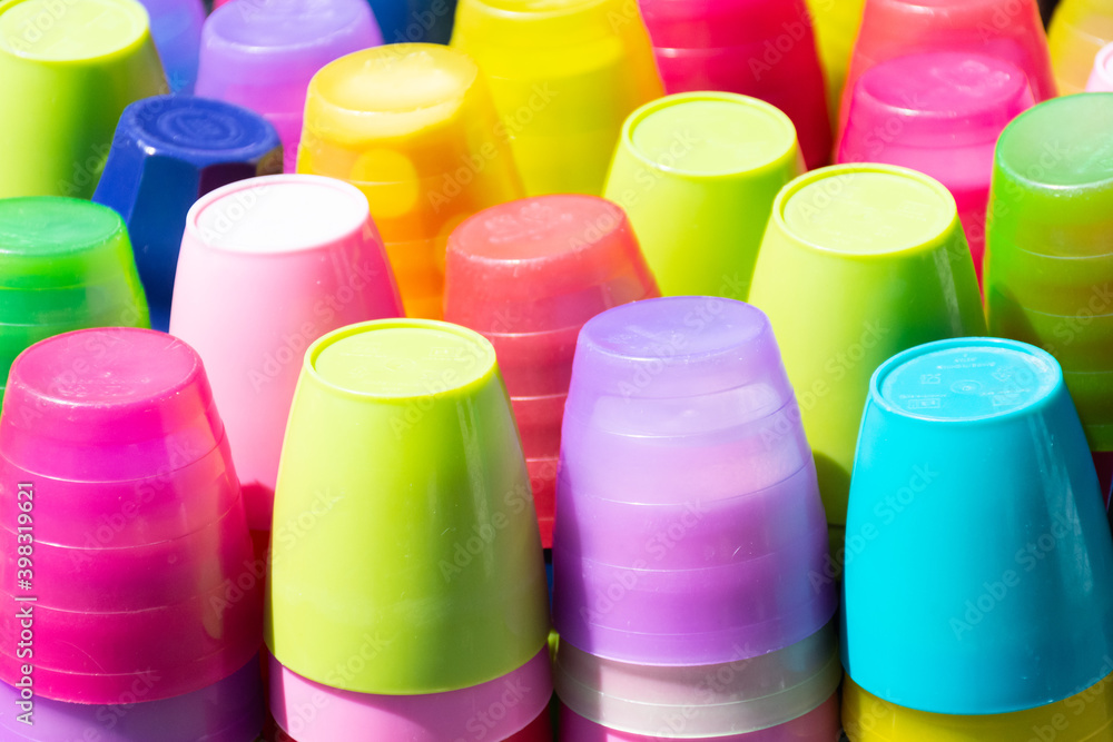 Close up of multi coloured plastic drinking cups Close up of multi coloured plastic drinking cups