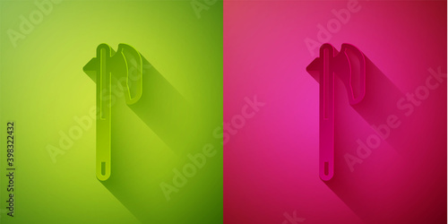 Paper cut Medieval axe icon isolated on green and pink background. Battle axe, executioner axe. Medieval weapon. Paper art style. Vector.
