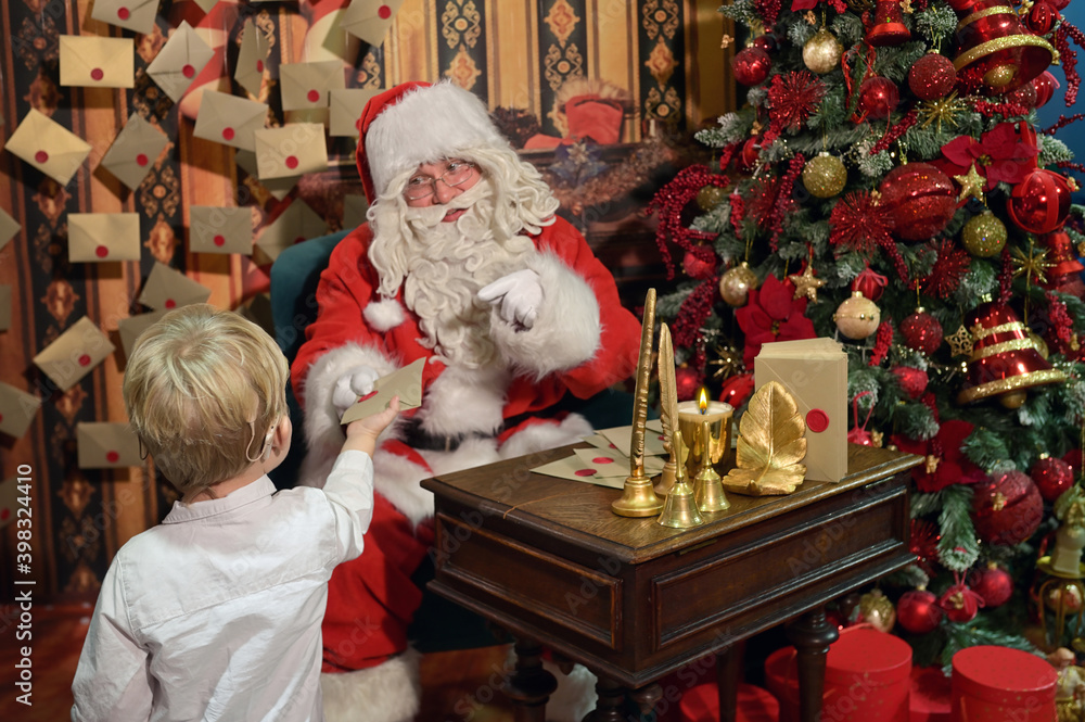 A Boy with Cochlear Implants and Santa Claus
