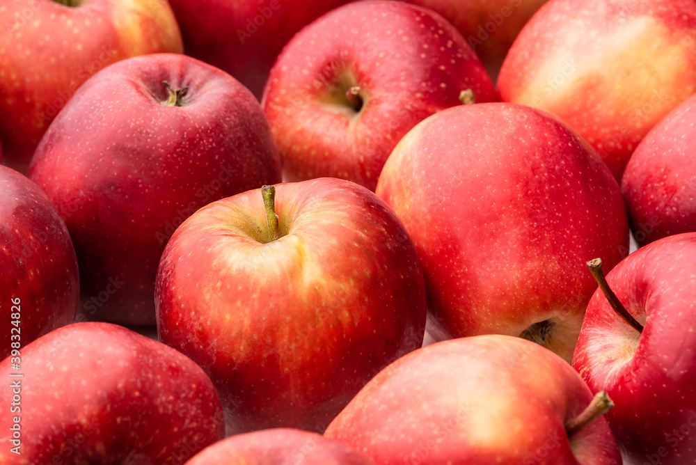 Red apples in a wicker basket. Isolate on white background Red apples in a wicker basket. Isolate on white background