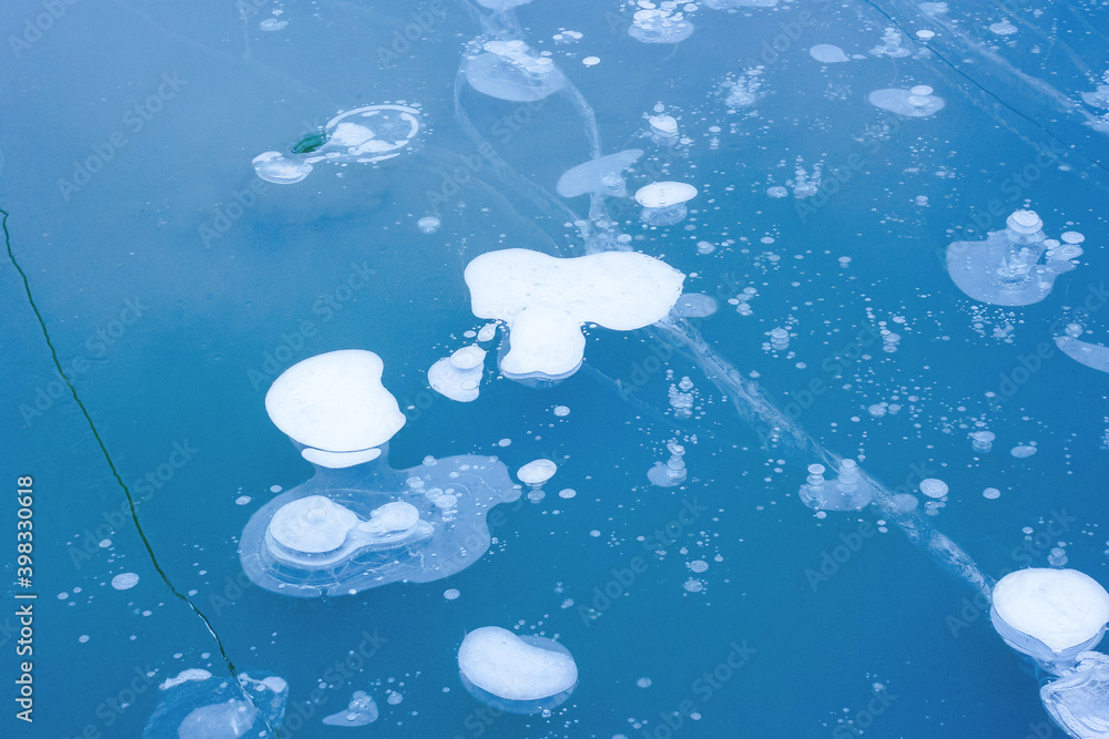 blue ice crack texture. frosty outdoor background in winter blue ice crack texture. frosty outdoor background in winter
