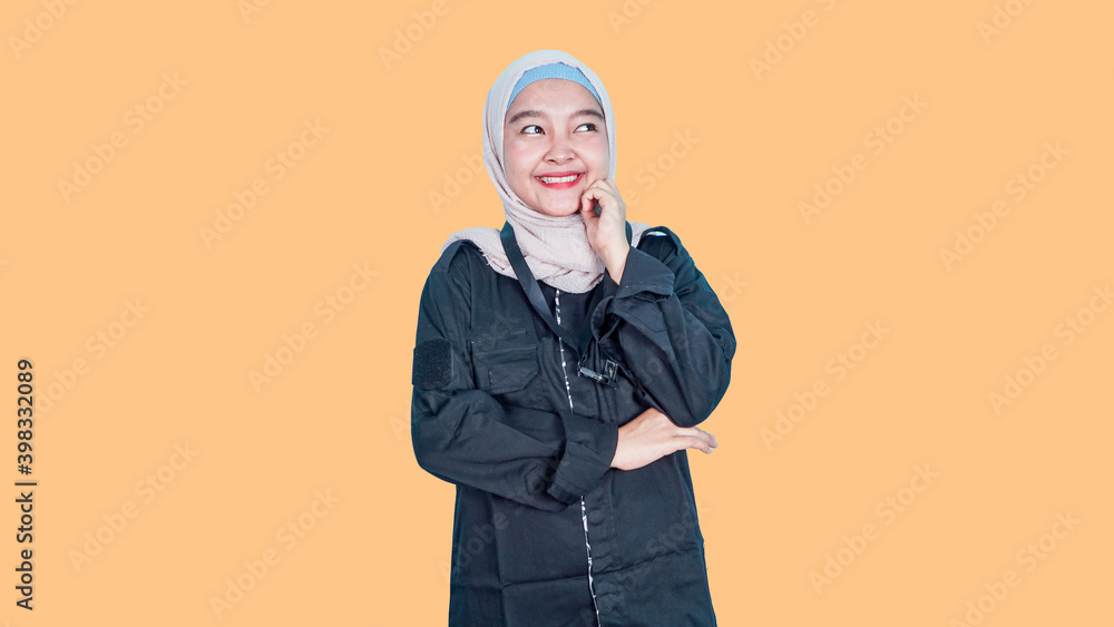 asian hijab woman looking sideways with doubtful and skeptical expression. asian hijab woman looking sideways with doubtful and skeptical expression.