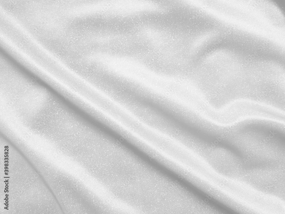 Shiny white crumpled fabric. Elegant cloth texture background Shiny white crumpled fabric. Elegant cloth texture background