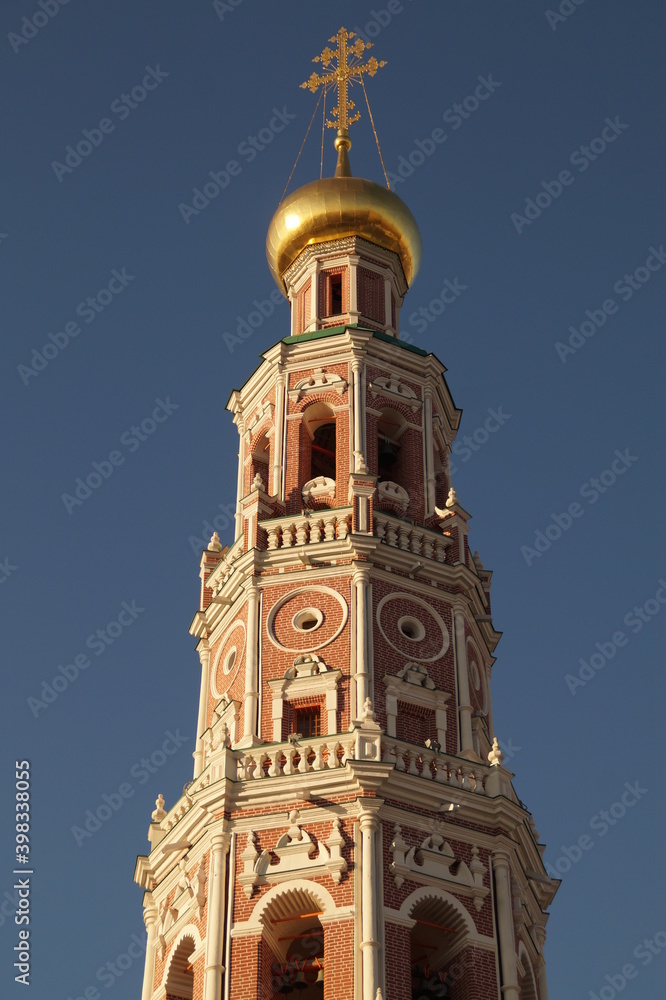 Orthodox Golden cross on the dome of the Church in Moscow, in the Novodevichy monastery on a Sunny day Orthodox Golden cross on the dome of the Church in Moscow, in the Novodevichy monastery on a Sunny day