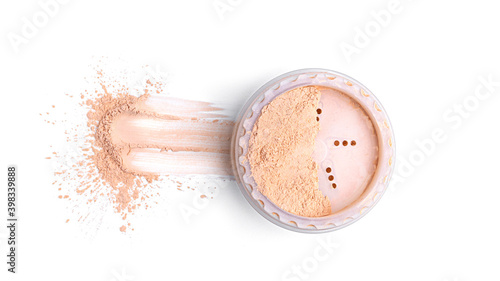 Jar with loose cosmetic powder on white background. High quality photo