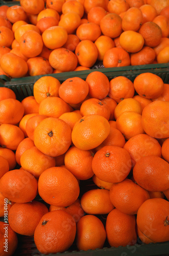 Mandarin, tangerines in the market as a background