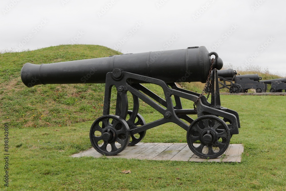 A cannon stands guard over Charlottetown Harbour from Prince Edward Battery in PEI.