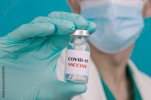 hand with coronavirus vaccine, medical doctor and science laboratory