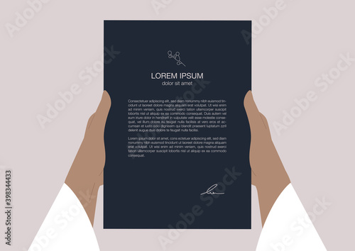 A text letter template, hands holding a piece of paper