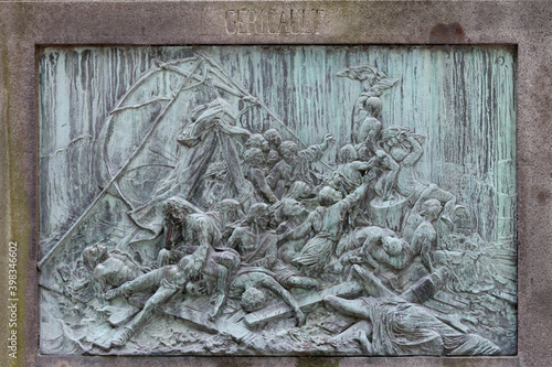 The Raft of the Medusa bronze picture on the tomb of Théodore Géricault in cemetery Pere-Lachaise 